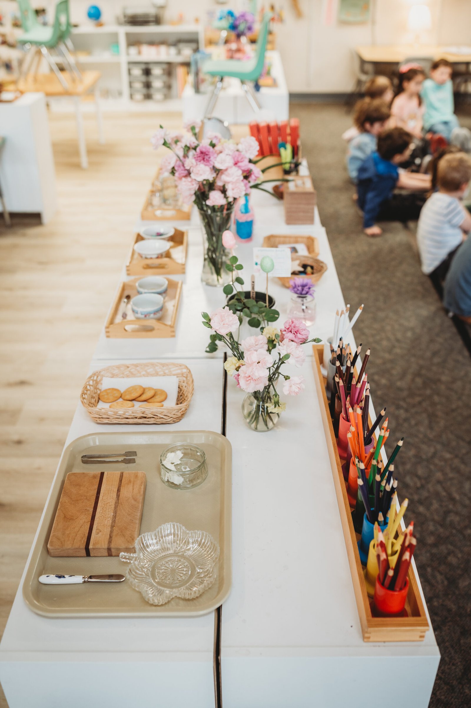 Montessori classroom at W Montessori Academy in Elmhurst, Illinois, with children working at child-sized tables